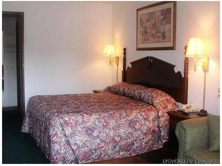 Scottish Inn And Suites Perry Ruang foto